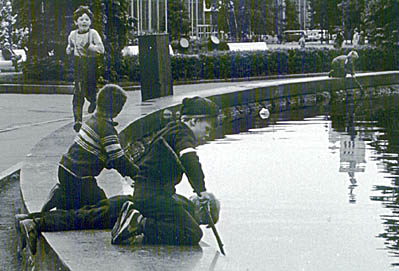 Boys looking in Water