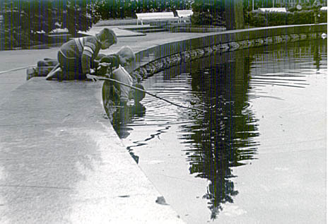 Boys looking in Water